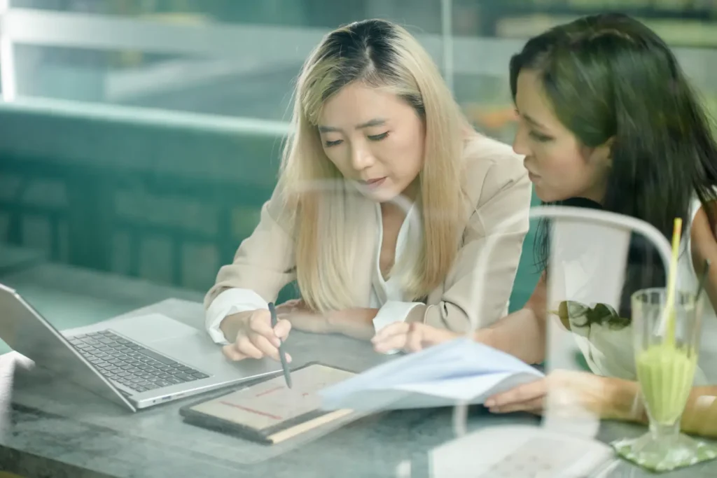 Business discussion supported by professional tax service expertise and financial documentation review